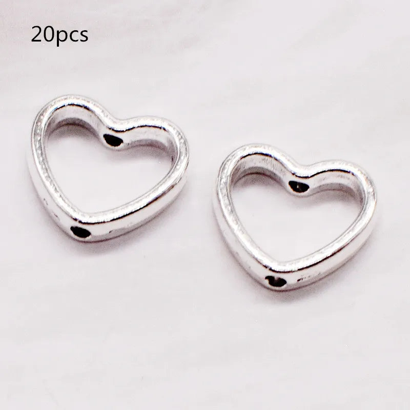 Fashion 20pcs/Lot Love Heart Hollow Loose