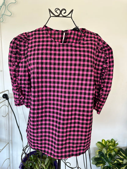 Pink and black blouse