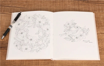 The Flower Year Colouring book