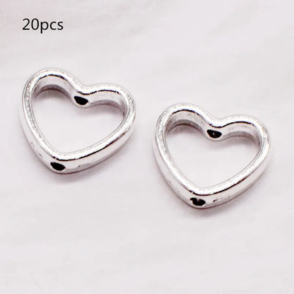 Fashion 20pcs/Lot Love Heart Hollow Loose